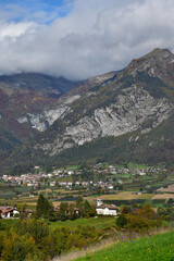 Fototapeta na wymiar Ponte Arche and its church, a small town in the municipality Comano Terme. Trentino, Italy.