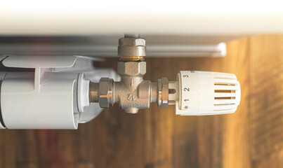 Temperature valve of radiator thermostat in modern home design and interior