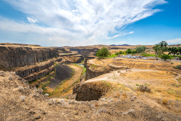 View from a lookout point of the Palouse Falls state park canyon and gorge next to the picnic and...