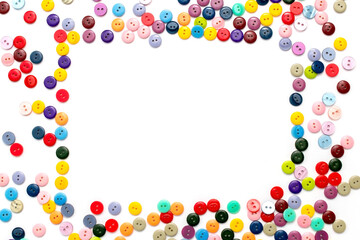 background with rectangular frame - multicolored buttons on a white surface