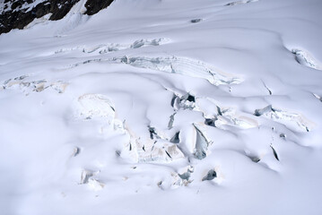 Fototapeta na wymiar Beautiful glacier landscape seen from Jungfraujoch on a sunny summer day. Photo taken July 20th, 2021, Lauterbrunnen, Switzerland.