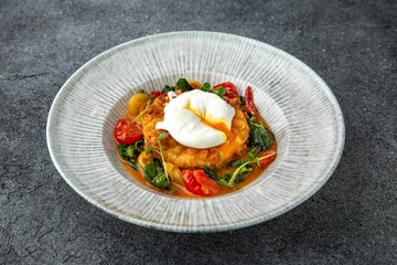 Turkey, chicken, or fish cutlet with grilled vegetables and sauce. Ready menu for the restaurant. Neutral gray blue textured background