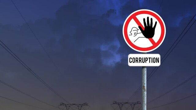 Signboard post with stop corruption text against dark clouds in the sky