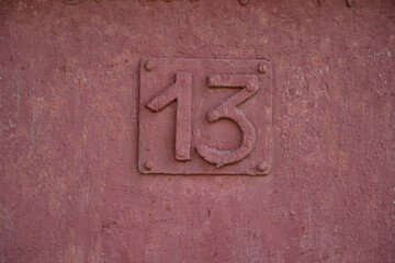 number thirteen on the door of an old house door, 13, number 13 - obrazy, fototapety, plakaty