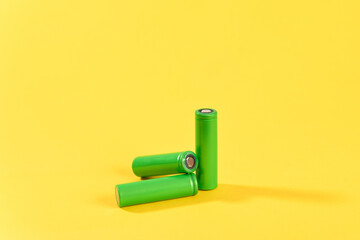 Lithium battery on yellow background.