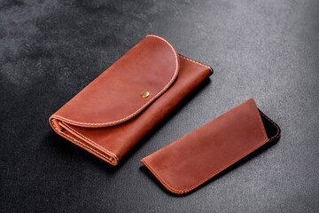 Beautiful leather brown purse made of leather to store paper money