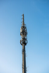 Mobile phone transmitter against blue sky