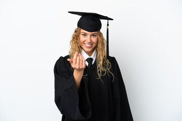 Young university graduate isolated on white background inviting to come with hand. Happy that you came