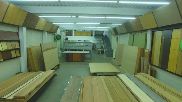 Warehouse with variety of wood for construction and repair. Wood Flooring Factory Production Line