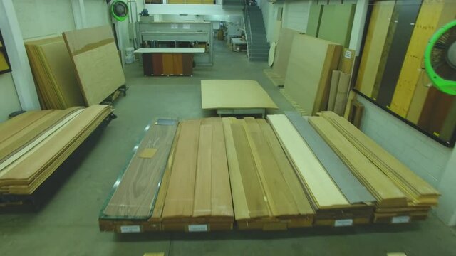 Warehouse with variety of wood for construction and repair. Wood Flooring Factory Production Line