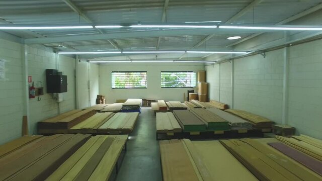 Warehouse with variety of wood for construction and repair. Wood Flooring Factory Production Line
