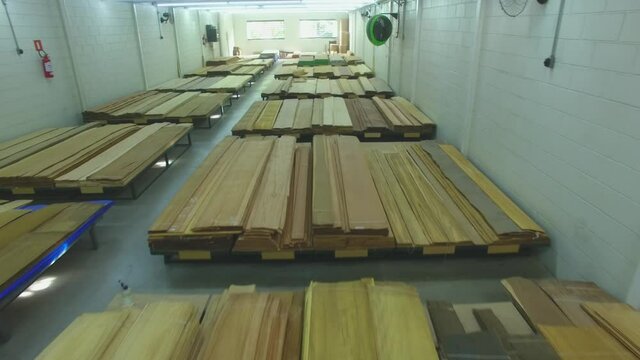 Warehouse with variety of wood for construction and repair. Wood Flooring Factory Production Line
