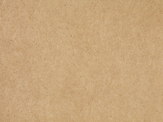 Closeup of a brown chipboard texture background
