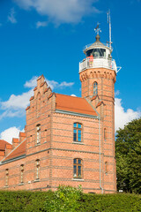 Old neo-Gothic lighthouse in Poland. Ustka on the Baltic Sea.
