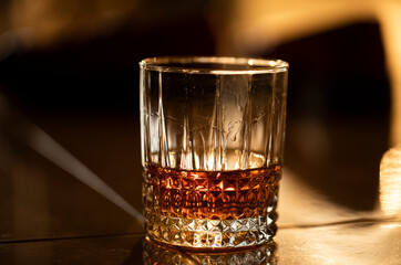 glass of whiskey. Whiskey glass. Background. 