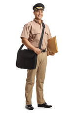 Full length portrait of a young mailman in a uniform carrying a bag and a letter