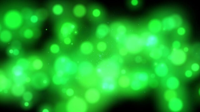 Defocused, blurred bokeh and abstract blurred green light element for cover decoration background. Royalty high-quality free stock video footage of colorful light, glowing backdrop overlay for design
