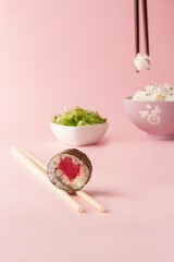 sushi, sushi salad, pink background. japanese food