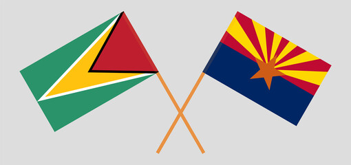 Crossed flags of Guyana and the State of Arizona. Official colors. Correct proportion
