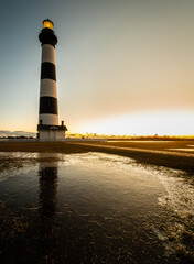 Bodie Island Lighthouse is located at the northern end of Cape Hatteras National Seashore, North...
