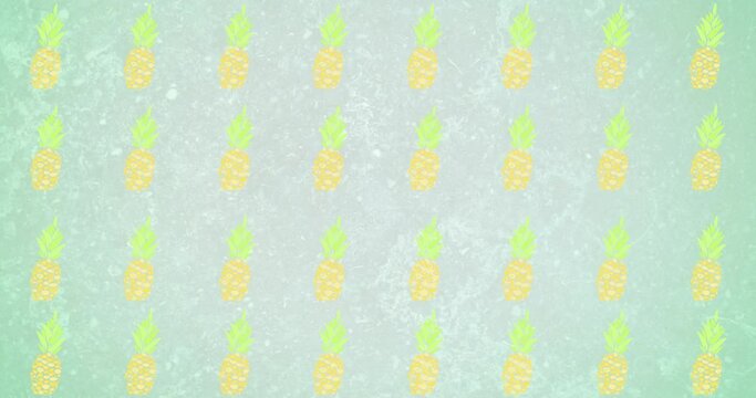 Animation of pineapples moving on green background