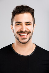 Obraz premium Young man Smiling in studio