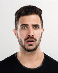 Fototapeta premium Young man with a astonished expression