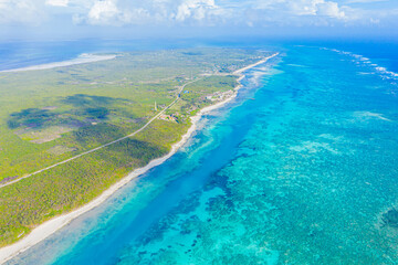 Aerial view to ocean waves. Blue water background. Dramatic colo