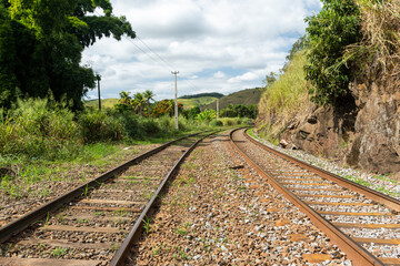 Fototapeta na wymiar View to train tracks on rural area in the countryside