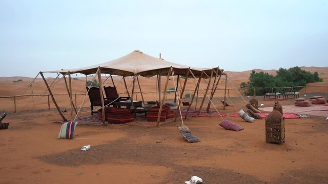 WS, view of a Luxury glamping desert camp tent on a rainy day in the S