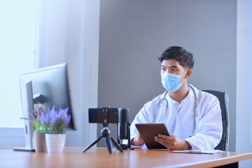 doctors use tablet and computor in work office hospital