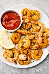 Golden spicy air fryer shrimp with cocktail sauce