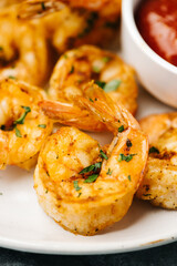 Closeup of golden spicy air fried shrimp