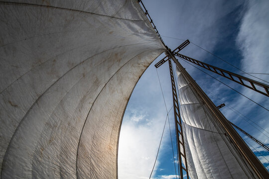 sails of yacht against the sky in Raja Ampat