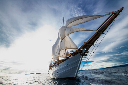 wide angle image of sail boat in Raja Ampat