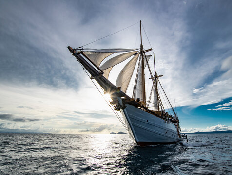 wide angle image of sail boat in Raja Ampat