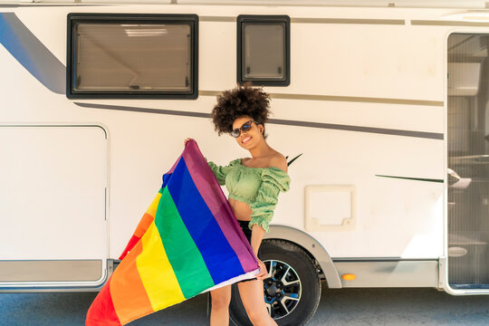 pretty african woman showing her gay flag