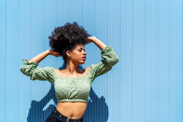 photography of woman with afro hair