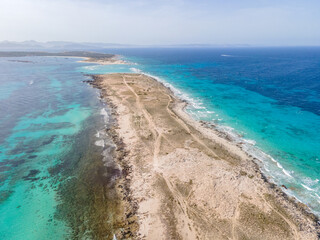 Fototapeta na wymiar Aerial view of sea and shore in Ibiza, Spain