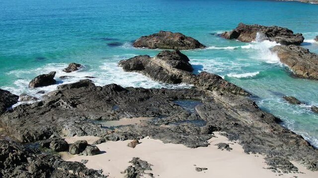Aquamarine tropical blue sea and rocks