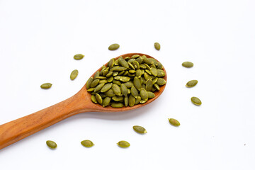 Pumpkin seeds on white background