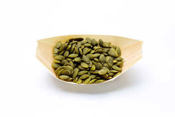 Pumpkin seeds on a white background
