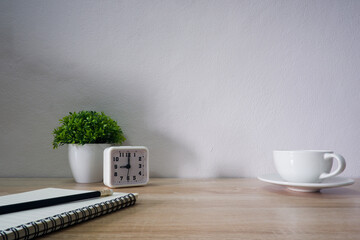 Top view white office desk table with the office equipments, computer
keyboard and other office supplies on the modern space, flat lay.