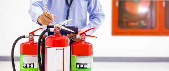 Fire extinguisher, Engineer inspection and checking pressure gauge level of fire extinguisher tank...