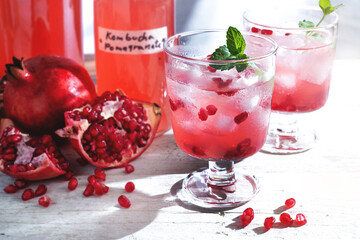 Fermented Pomegranate kombucha drink, Homemade probiotic black tea with fresh Pomegranate, healthy flavored drink