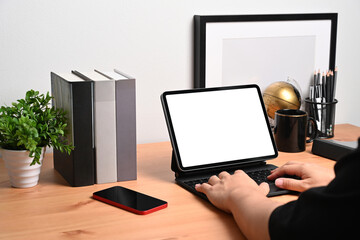 Man freelancer working with computer tablet.
