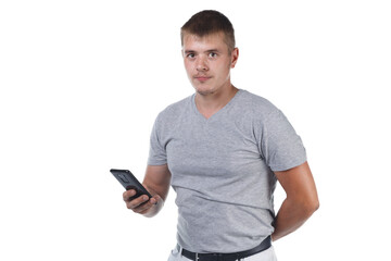 Image of young man with bristle holding smartphone