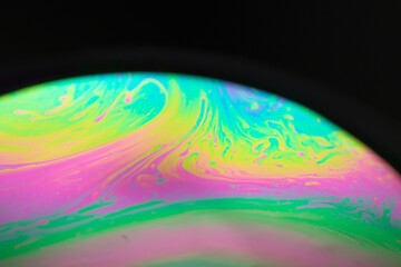the beauty of the colorful pattern of soap bubbles is like a small planet