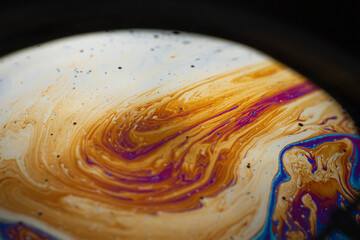 the beauty of the colorful pattern of soap bubbles is like a small planet