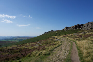 Fototapeta na wymiar Cliffs of Stanage Edge in Derbyshire Peak District on bright sunny day